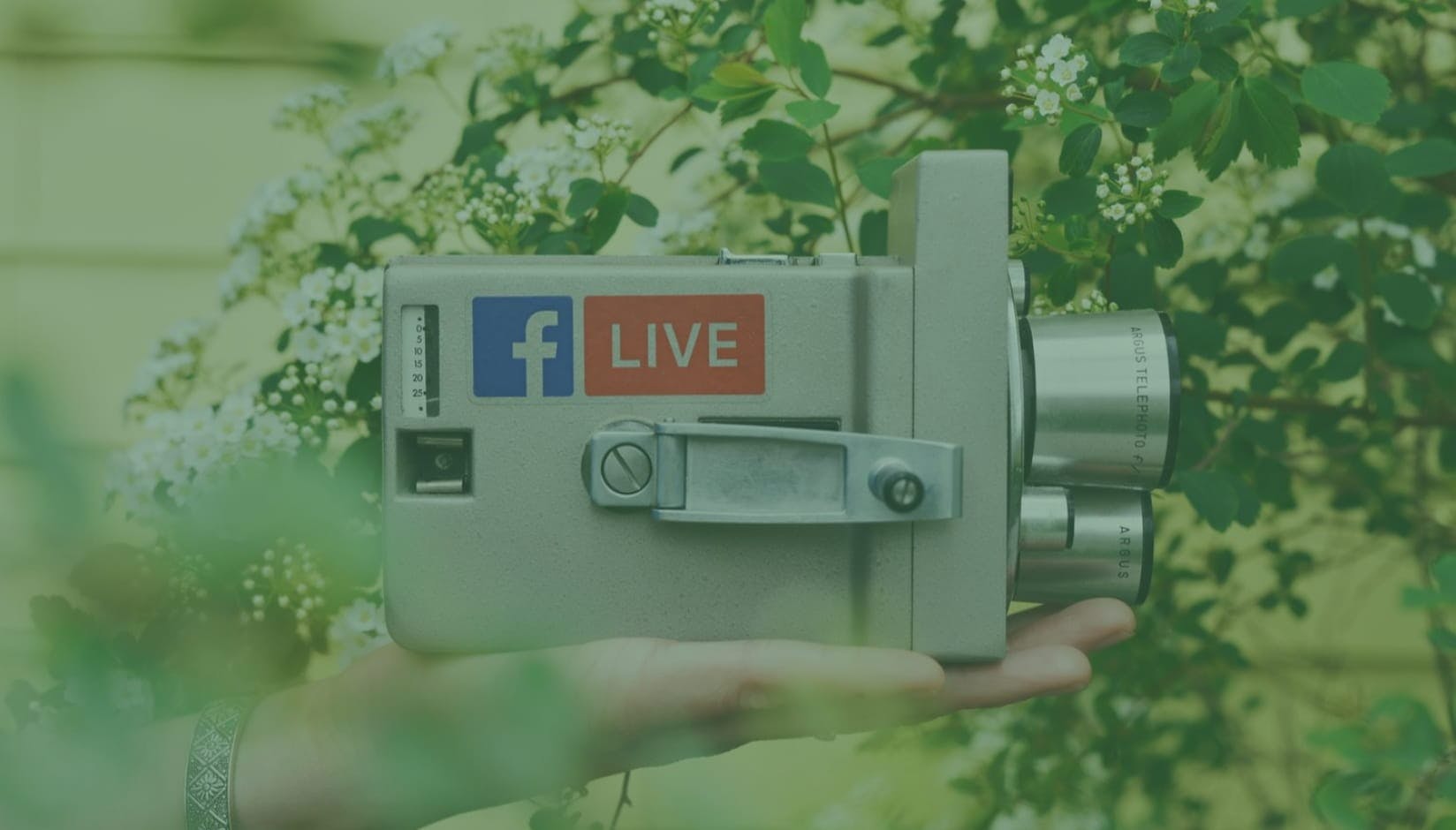 retro video camera with Facebook Live logo for coworking space promotion