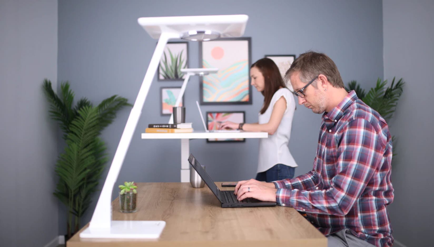 Members working at the desks at a coworking space